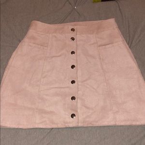 Light pink suede mini button up skirt